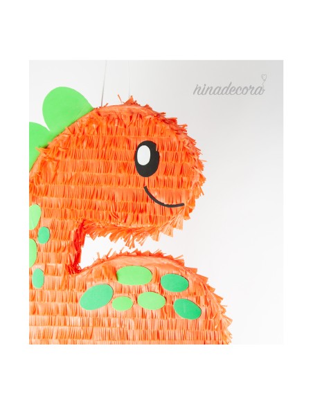 Piñata dinosaurio naranja para fiesta