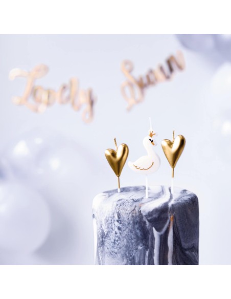 Velas cisnes y corazones dorados